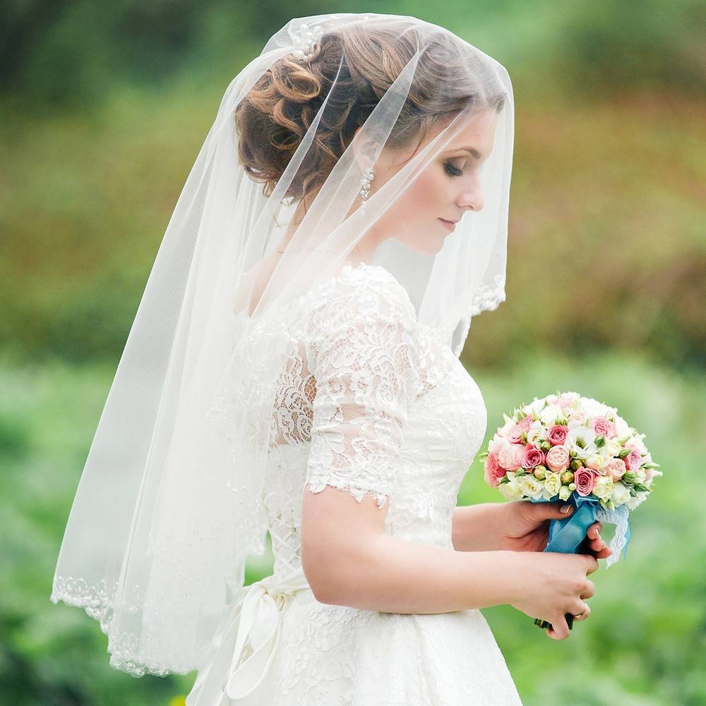 Cвадебные прически с фатой — гармоничный образ невесты